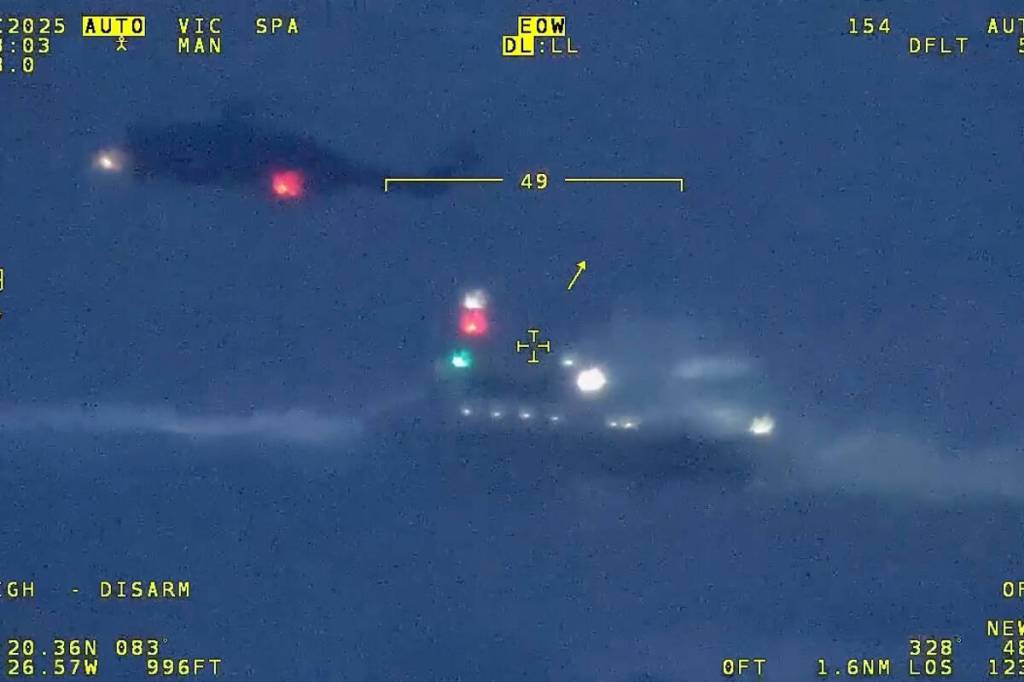 Crews scour the dark and stormy Salish Sea for naval sailor overboard Monday (Dec. 8) evening. (JRCC Victoria screenshot)