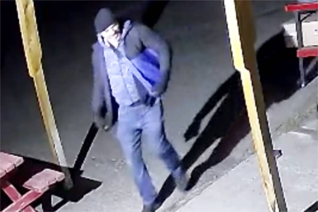 A screenshot provided of surveillance video captured during an alleged meat theft featuring a suspect RCMP are hoping to identify. (RCMP image)