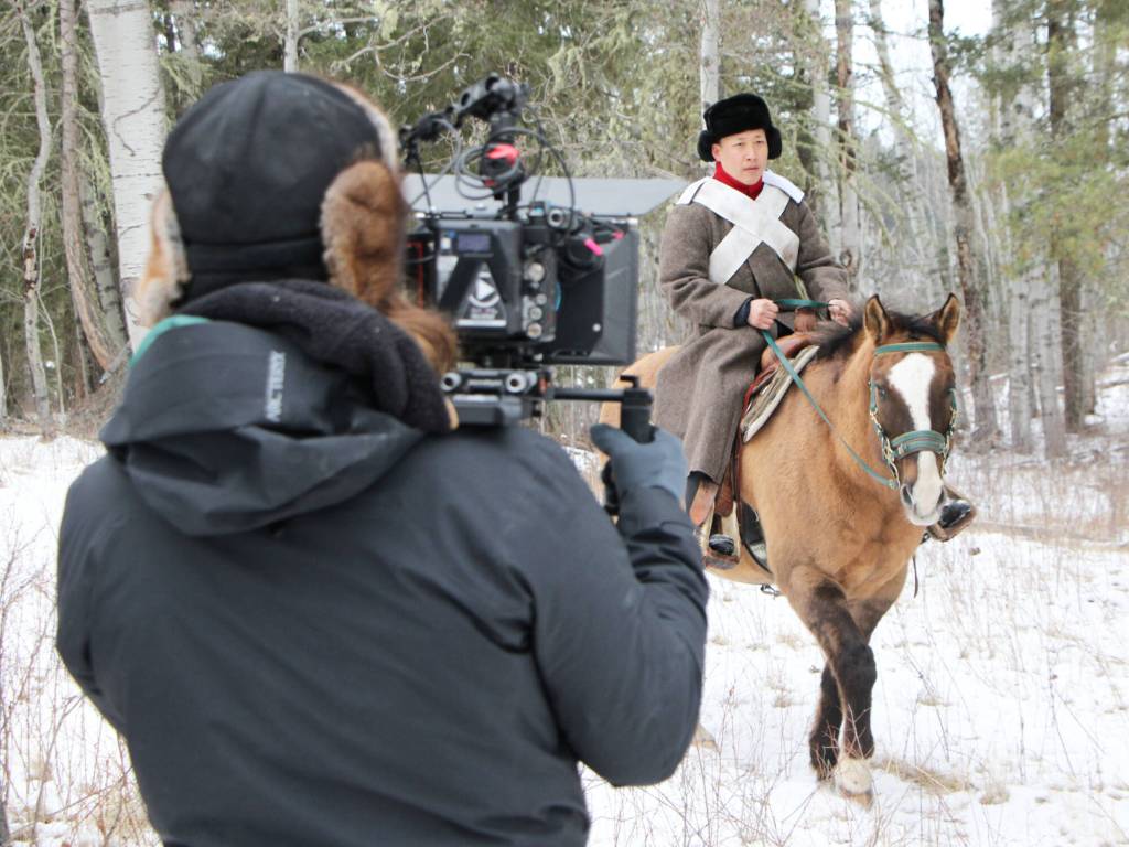 Sergej Krivenko, director of photography, films Sergey Kim during a shoot for During Winter I Thought of My Father. (Patrick Davies photo - 100 Mile Free Press)